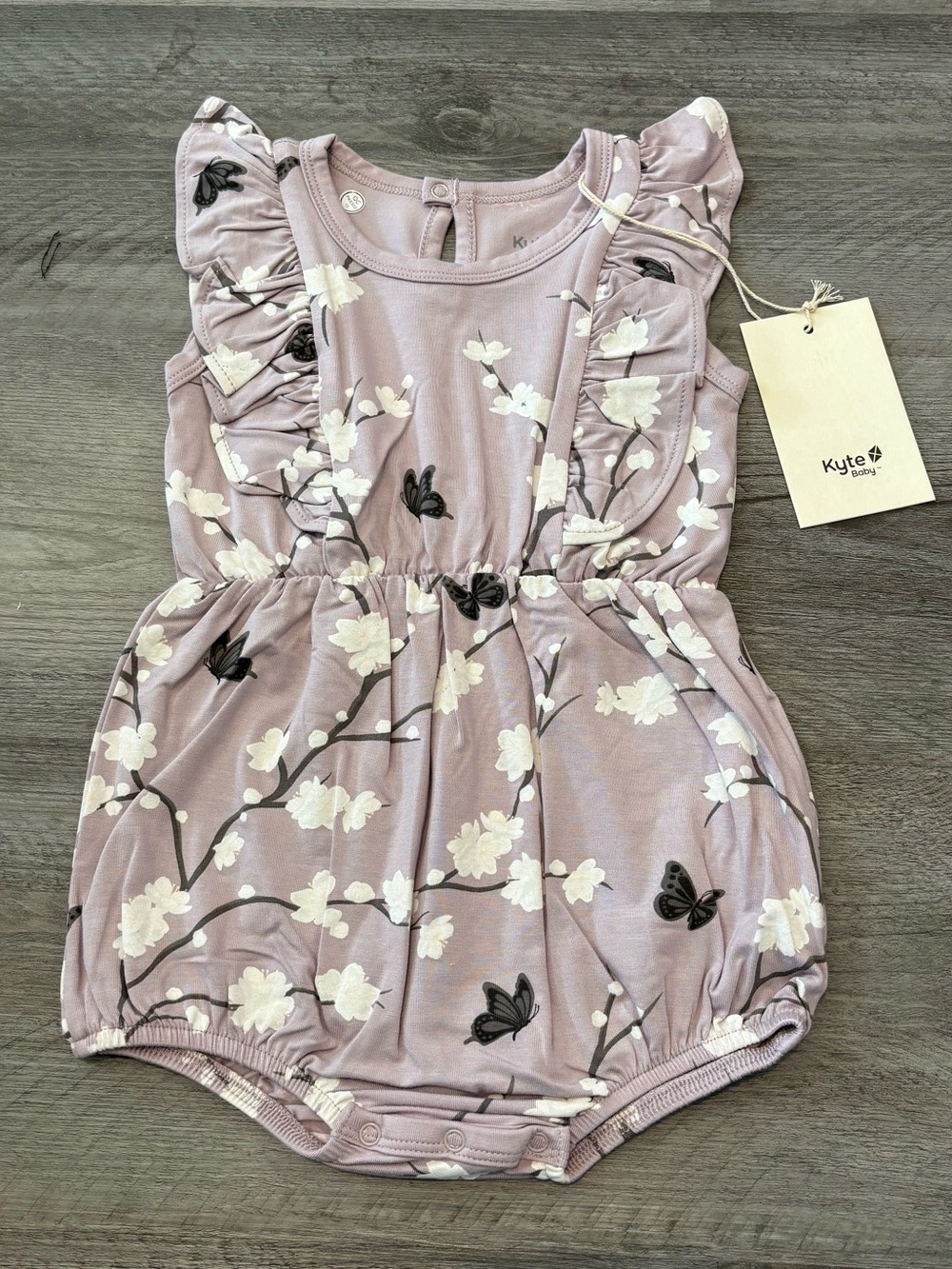 Kyte BABY Dusty Lilac Bamboo Cherry Blossom Floral Ruffle Romper